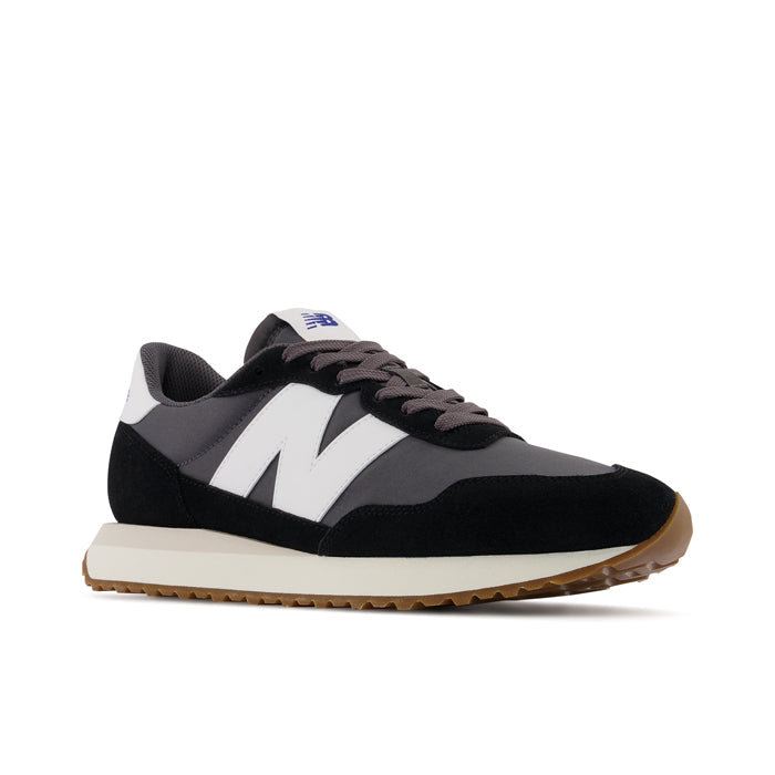 New balance store black magnet